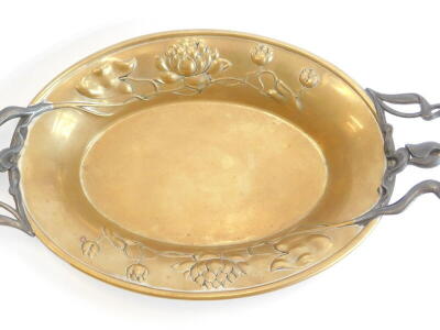 A continental Art Nouveau brass and pewter two handled dish, embossed and cast with lilies and tulips in the manner of WMF, 42cm wide. - 2