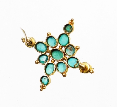 A Victorian turquoise set cross brooch, the design with various oval and circular cut turquoise stones, in a rub over yellow metal setting, unmarked with a single pin back, 4cm wide, 6.2g all in. - 2