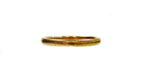 A George V 22ct gold wedding band, with pleated rubbed decoration, Birmingham 1923, ring size N, 3.5g.