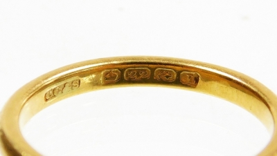 A George V 22ct gold wedding band, with pleated rubbed decoration, Birmingham 1923, ring size N, 3.5g. - 2