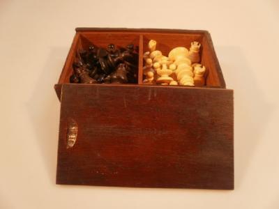 A 19thC natural ivory and horn chess set