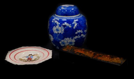 A Chinese porcelain blue and white ginger jar and cover, decorated with prunus blossom against a cracked ice ground, four character, 19cm high, together with a 19thC transfer printed child's plate, The Haymaker, and a Japanese black lacquered pen box. (3)
