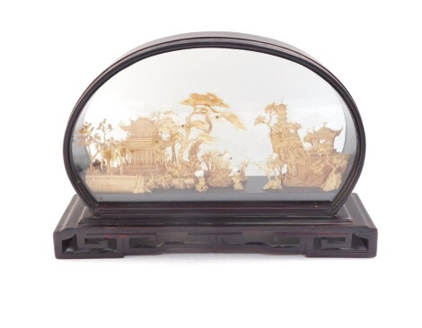 A Chinese Republic cork diorama montage, showing pagodas, trees and storks, wooden cased, 32cm wide.