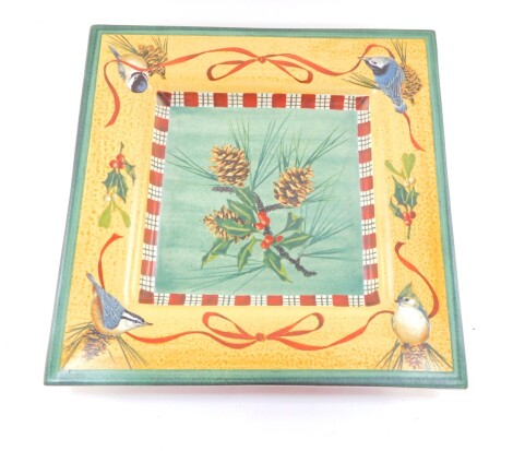 A Lenox pottery square dish decorated in the Winter Greetings pattern, designed by Catherine McClung, 37.5cm wide.