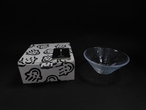 An Orrefors cut glass bowl decorated in the Happy pattern, designed by Martti Rytkonen, 5008/12, boxed, 19.5cm diameter.