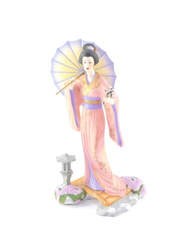 A Franklin Mint porcelain figure modelled as Yoshiko, designed by Manabu Saito, boxed, 28cm high.