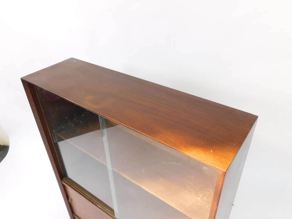 A Herbert E Gibbs autographed vintage 1970's teak bookcase, with