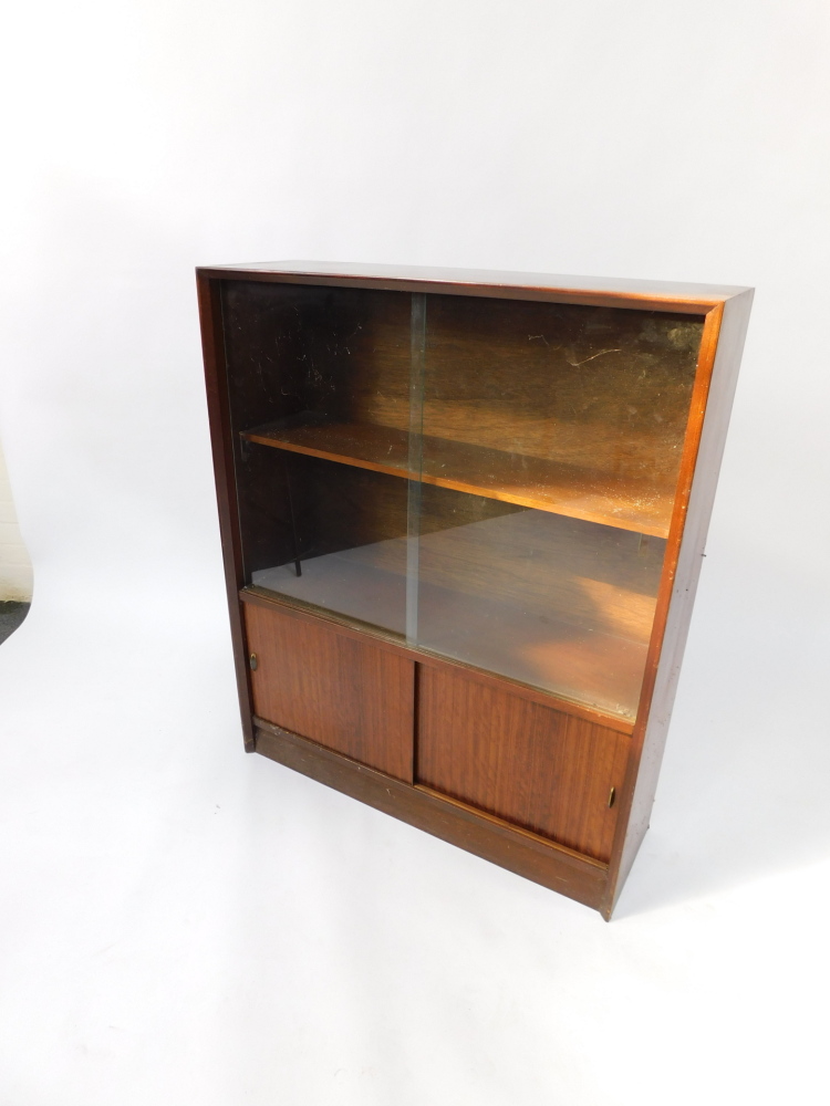 A Herbert E Gibbs autographed vintage 1970's teak bookcase, with