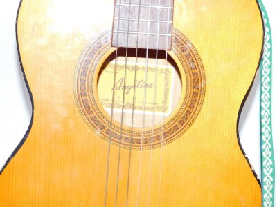 A Dulcet Classic Rose-Morris acoustic guitar, stock no 3057, with shaped case, articulated tuning knops and six strings, with interior label, 106cm high, and an Angelica guitar, model 2850, 93cm high (2) - 3