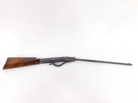 An air rifle, no. 10244 to the barrel, with brake action, 90cm wide.