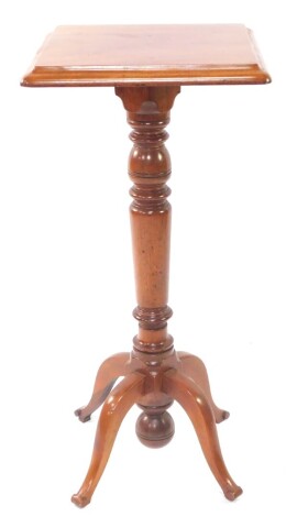 A Victorian mahogany jardiniere stand, with a wide moulded top, raised on a turned stem, terminating in quadrupled scroll legs, 100cm high, 47cm wide, 47cm deep.