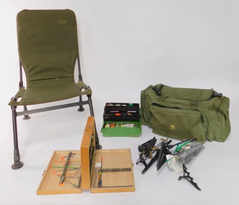 Fishing tackle and equipment, to include a beech box containing floats, accessories, floats, Long Point, etc, contained in a green canvas fishing bag, 61cm wide, and a canvas folding chair. (a quantity)