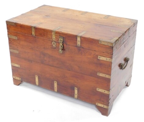 A 19thC oak and partially brass bound campaign style silver chest or coffer, with visible brass banding, elaborate escutcheon, candle box interior and side carrying handles, on shaped feet, 60cm high, 92cm wide, 52cm deep.