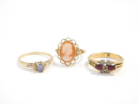 A 9ct gold and cameo ring, size K, and two 9ct gold and gem set rings, sizes P/Q and Q, 6.1g. (3)