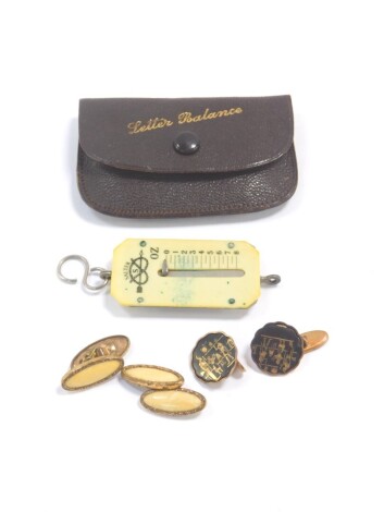 A pair of Egyptian niello and gilt metal chain link cuff links, further pair of cuff links, and a set of Salter letter balance scales, with a wallet.