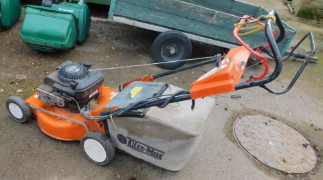 An Oleo-Mac Serie G rotary mower, with self drive mechanism, and Briggs & Stratton 55 engine.