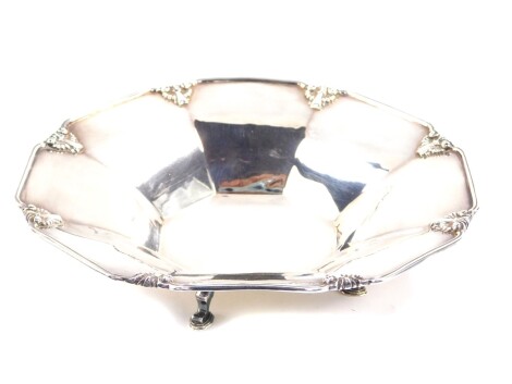 A George V silver octagonal dish, with stylised gadrooned shell decoration, raised on four hoof feet, Birmingham 1929, 11.36oz.