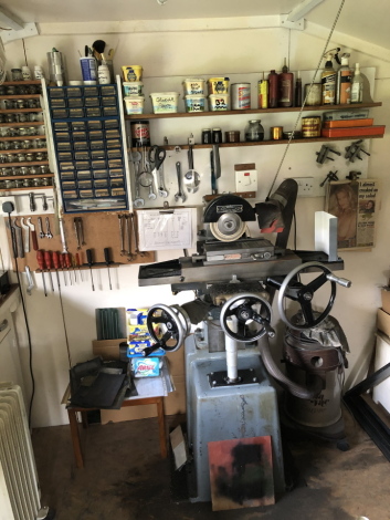 An Eagle surface grinding machine, serial no 3388, being a single phase unit with a permanent magnetic chuck, together with grinding paste, old slip stones, and associated items to the tooling and cabinets above, and a quantity of files, grinding wheels, 