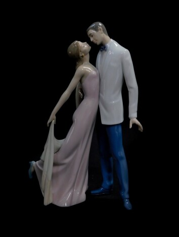 A Lladro porcelain figure modelled as Happy Anniversary, No 06475, boxed.