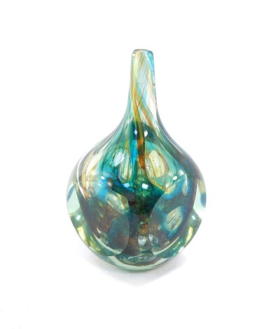 A 20thC Mdina Studio glass bottle vase, of shouldered form, with cylindrical stem, with swirled green and amber coloured glass centre, marks and partially labelled to the base, 21cm high.