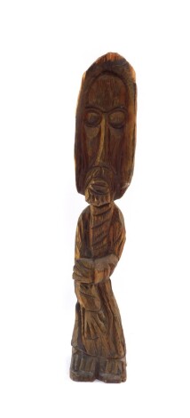 A 20thC carved figure of a standing gentleman, with beard and hood, unmarked, 42cm high.