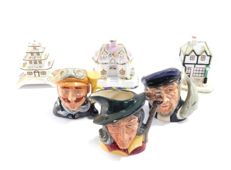 Three Coalport porcelain cottages, comprising Pagoda House, The Old Curiosity Shop and The Country Cottage, together with three Royal Doulton character jugs, comprising Pied Piper D6462 (AF), Veteran Motorist D6637 and Capt Ahab D6506. (6)