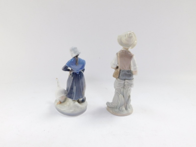 A Royal Copenhagen porcelain figure of a girl with a goose, second, No 528., printed and painted marks, together with a Lladro porcelain figure, (AF). (2) - 2