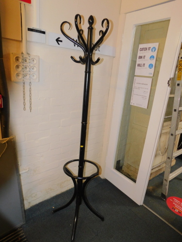 A mid 20thC ebonised hat and coat stand, 183cm high. (AF)