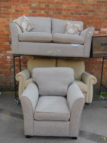 A two seater sofa bed, upholstered in grey chenille fabric, 172cm long, together with a matching armchair. (2)