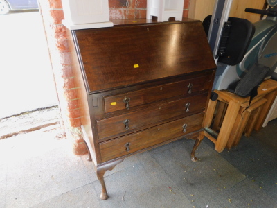 An early 20thC mahogany bureau, with fitted interior, 99cm high, 76cm wide, 41cm deep.