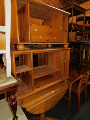 A beech drop leaf kitchen table, together with two pine television stands. (3)