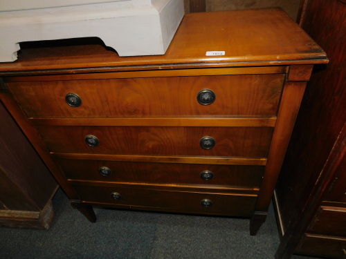 A walnut chest of four drawers, with loop handles, 80cm high, 81cm wiide, 38cm deep.