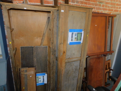 Two pine framed cupboards, together with two single bed frames. (4)