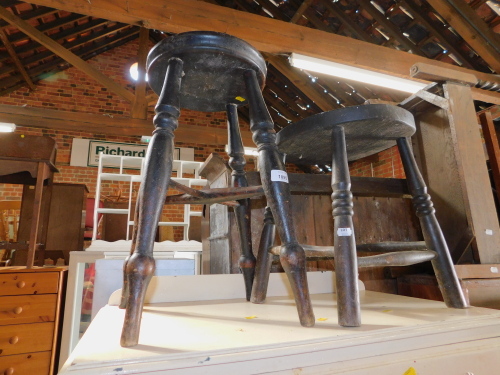 Two stained beech 19thC stools, with turned legs.