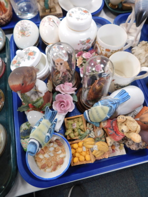 Glass paperweights, to include dolphin paperweight, 9cm diameter, Wedgwood Kutani Crane lidded jar, ceramic egg ornaments, Wade biscuit barrel, Royal Commemorative cups, small quantity of glassware, etc., (3 trays). - 4