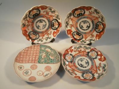 Three matching plus one other 19thC Japanese Imari plates