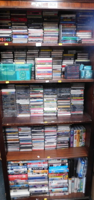 CD's to include classical music, Beethoven, etc., Karaoke Anthems, and videos to include Agatha Christie, Poirot, etc. (1 bookcase).