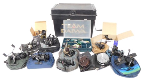 Fishing tackle and reels, to include a Team Daiwa tackle box stool, containing a quantity of canvas bags, including Shakespeare, 22cm wide, a Ambidex casting reel, Regal 4550 BRT boxed reel, other ball bearing reals, Aero S-8.5, Daiwa Regal 4000bri, 3000D