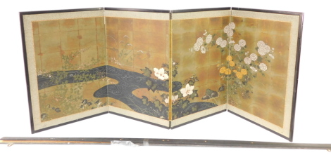 A four fold Japanese screen, decorated with flowers, in blue and green, in ebonised frame, with hanging mount, 71cm high.