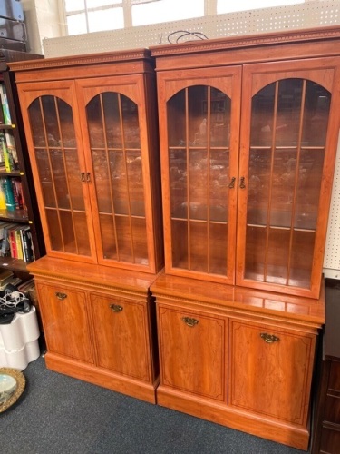 Two yew wood display cabinets.