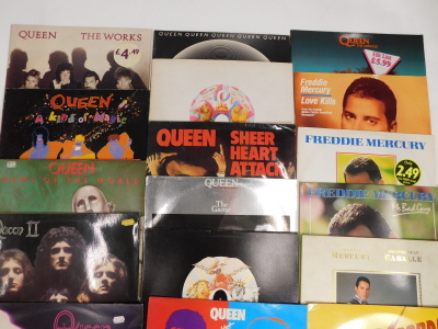 A collection of Queen and Freddie Mercury albums and singles, to include Love Kills, I Was Born to Love You, A Kind of Magic, News of the World, Queen, Queen II, Mr Bad Guy, The Works, Barcelona, Hot Space, A Day at the Races, A Night at the Opera, Flash - 3