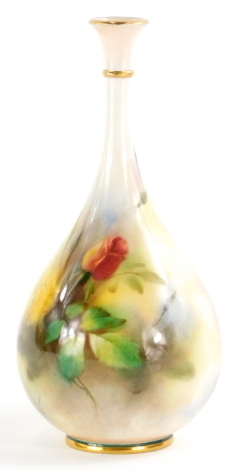 A Royal Worcester porcelain Hadley ware bottle shaped vase, painted with roses, indistinctly signed, printed marks in blue to base, 21cm high.