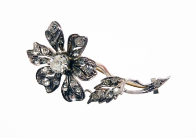 A Victorian silver and paste stone set floral spray brooch, in silver gilt finish, unmarked, 4.5cm high.