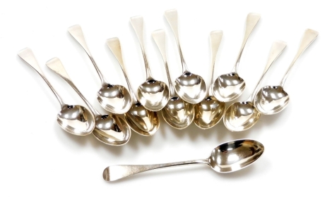 A set of twelve Victorian Old English pattern silver dessert spoons, London 1881, 17.5oz. (12)