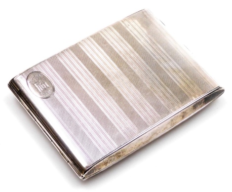 A George V silver cigarette case, with engine turned banded decoration, and inscribed Christmas 1925 Olympia, with part fitted interior, Birmingham 1924, 12cm wide, 5.3oz all in.