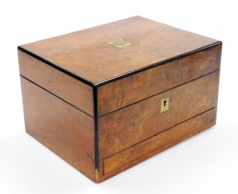 A Victorian walnut writing and jewel box, the top inset with a brass plaque bearing presentation inscription to Miss Congrene March 23 1875, opening to reveal a wooden interior with blue lining, and additional pull out tray, 18cm high, 30cm wide, 22cm de