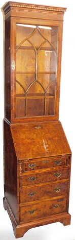 A walnut bureau bookcase, in the Georgian manner, the glazed top with astragal glazed door above a fall, above four drawers, on bracket feet, 188cm high, 52cm wide, 48cm deep.