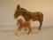 A Beswick donkey and Beswick foal