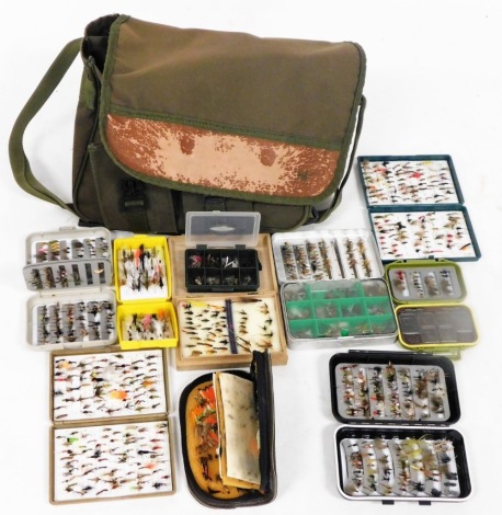 Two fox box fly cases, other various fly cases and a collection of wet and dry flies and lures, and a nylon canvas tackle bag.