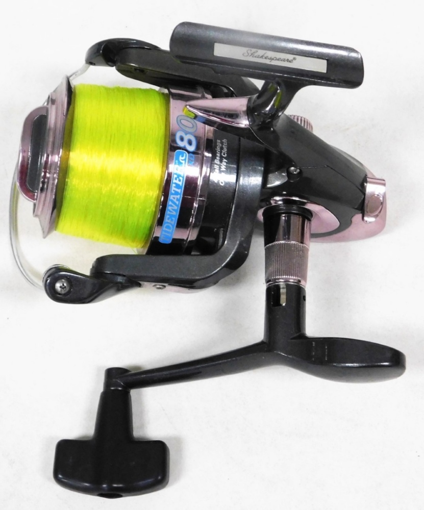 A Shakespeare Tidewater XD80 fixed spool fishing reel, two other fixed spool  reels and a Wychwood